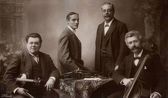 The Brodsky Quartet, active from 1895 until circa 1918, of Manchester, England, led by Dr Adolph Brodsky (1851-1929), with Christopher Rawdon Briggs (1869-1948), Simon Speelman (1852-1920) and Carl Fuchs (1865-1951). (photo: Percy Guttenberg, Manchester, circa 1907, postcard published by the Rotary Photographic Co Ltd)