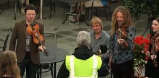 What happens when a security guard stops an Irish music flashmob