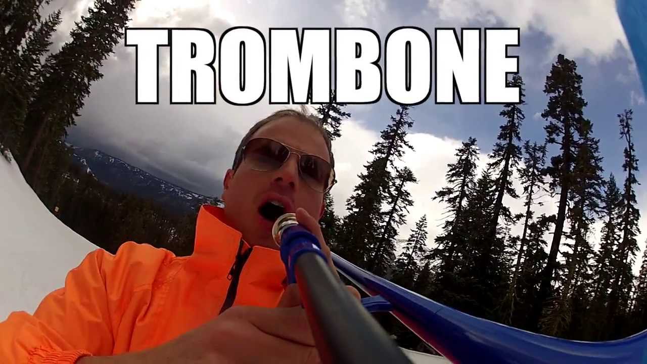 Musician Playing the Trombone While Skiing
