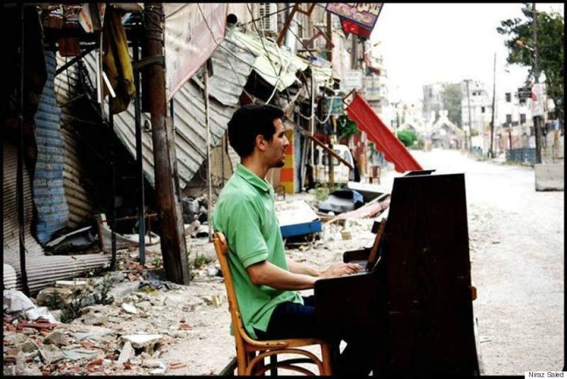 Ayham Ahmad continues to play the piano in spite of the challenges the civil war has put in his way.