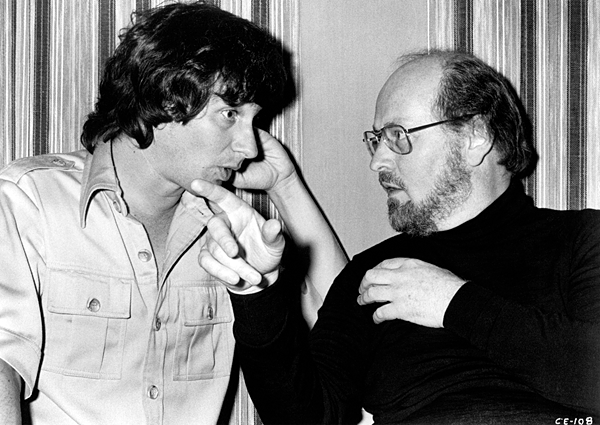 Classic behind the scenes photograph of Steven Spielberg working with John Williams on the score for Close Encounters of the Third Kind (1977).