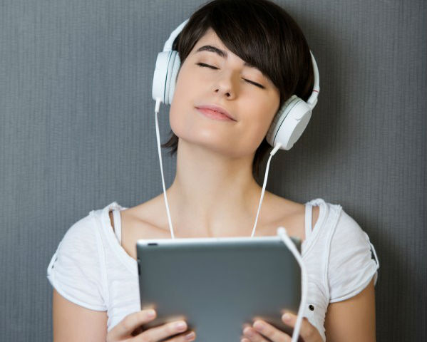 A woman listening to music