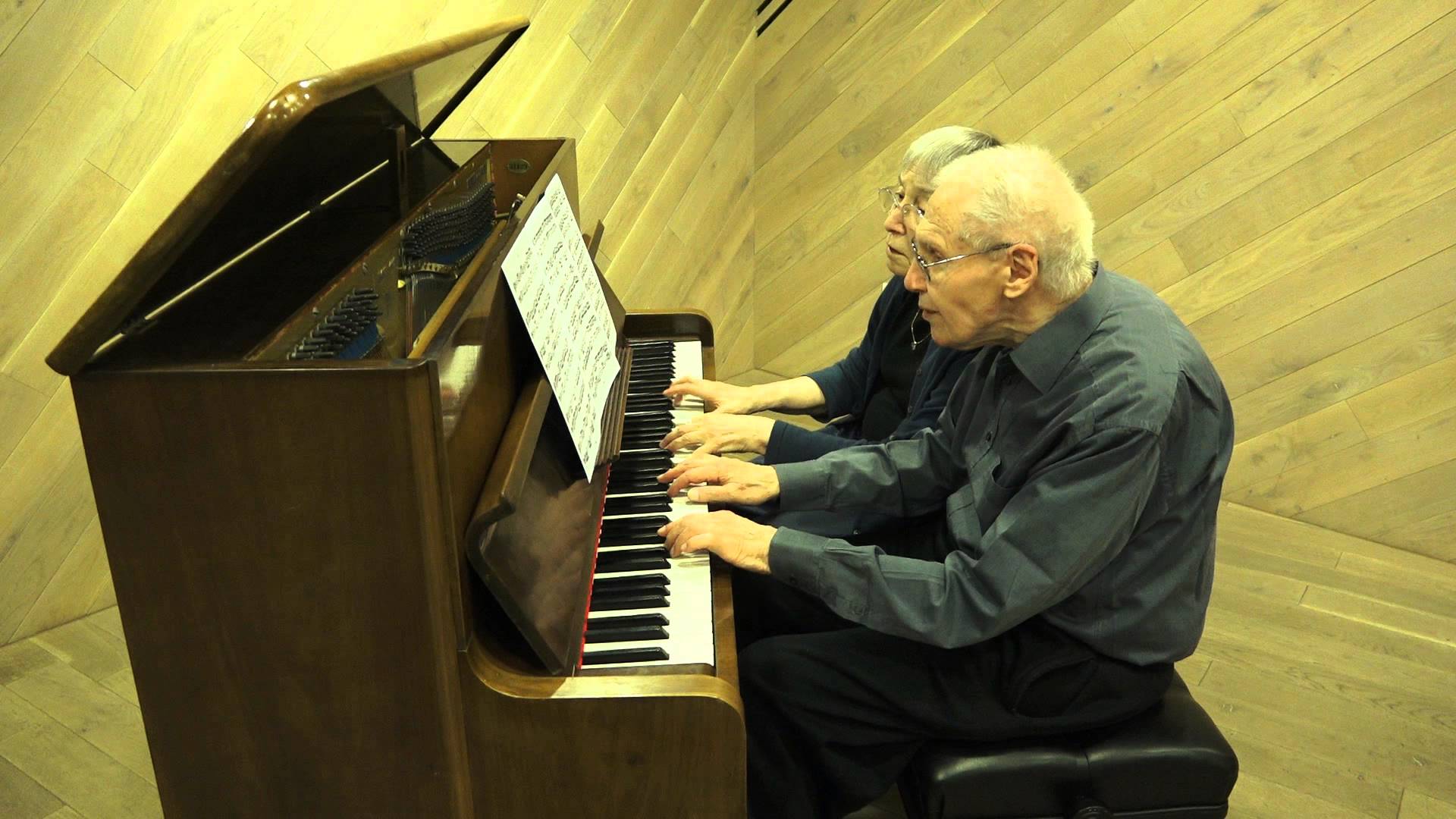 90-year-old couple playing Bach duets