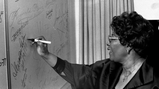 Ella Fitzgerald signs her name at the Opera House. Photo: supplied