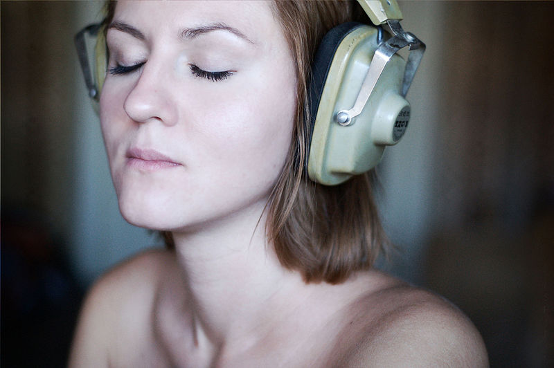 Woman listens to music