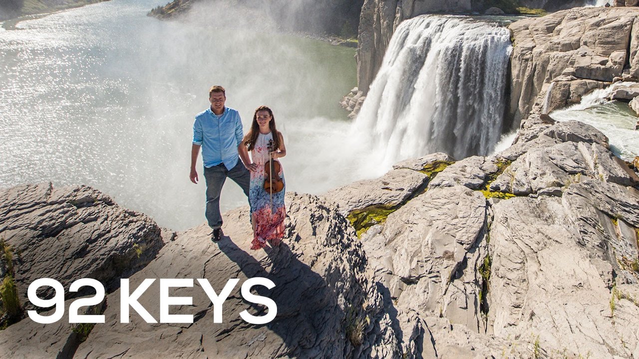 Watch how this piano-violin duo performs from top of waterfall