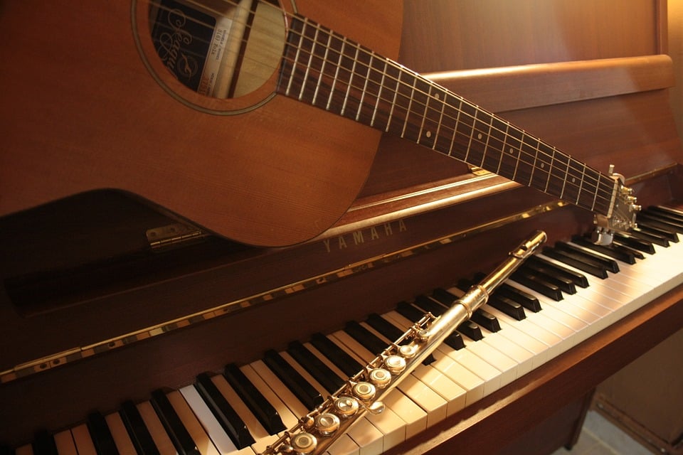 Guitar vs Piano