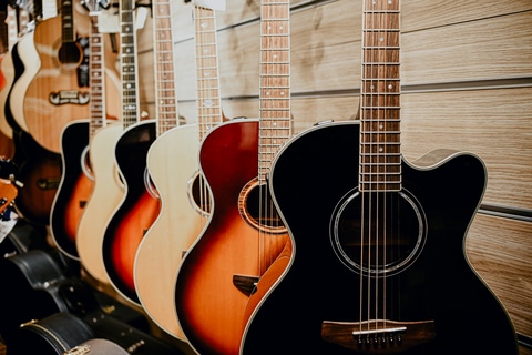 Many Acoustic Guitars
