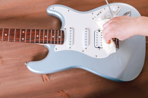 Polishing electric guitar