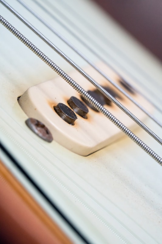 Closeup of vintage electric guitar pickup