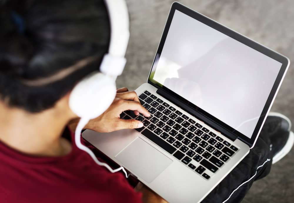 Man Listening Music Laptop