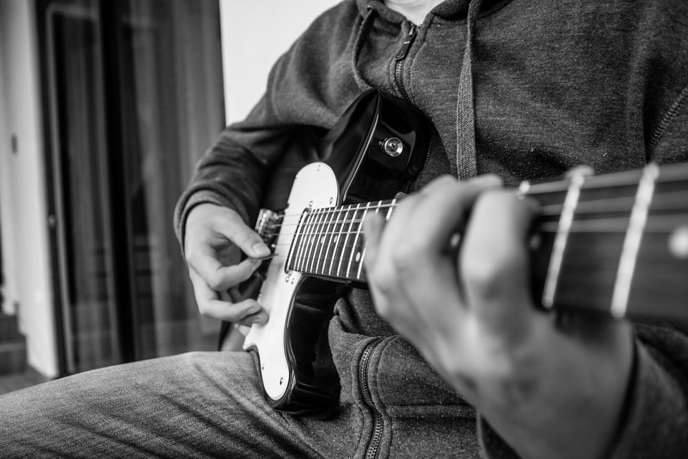 Young man playing guitar