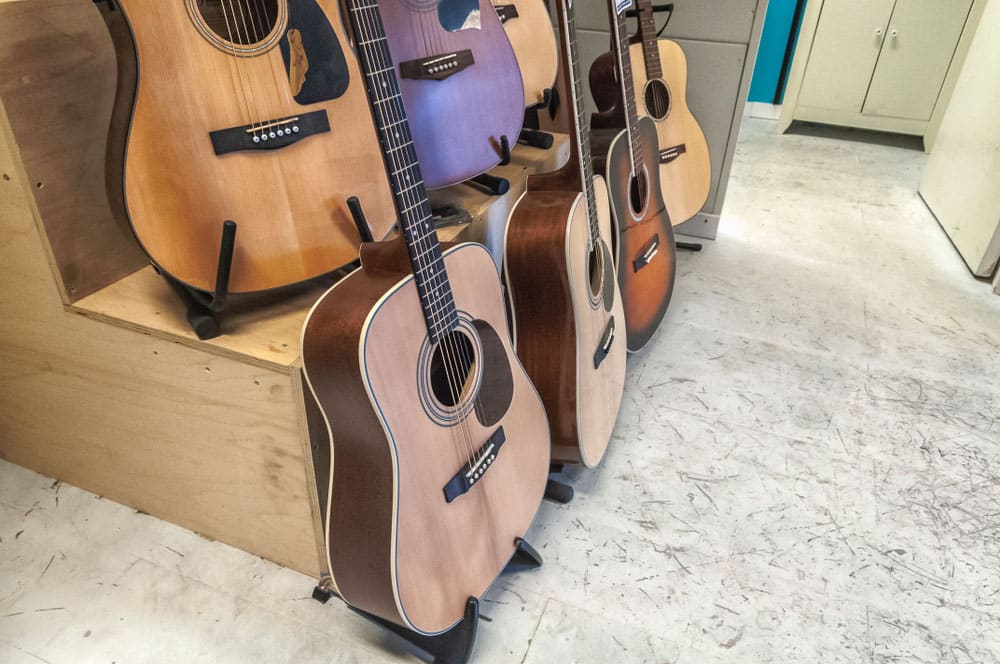 acoustic guitars in a standard at a guitar shop