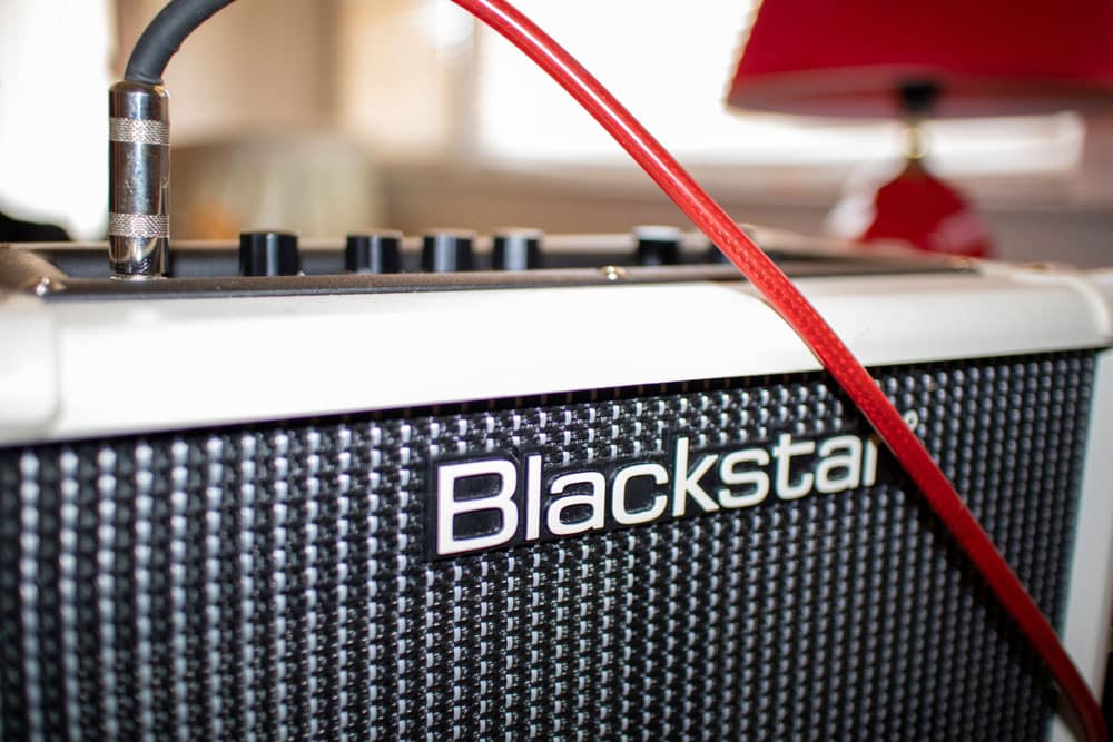 Blackstar amplifier and red guitar cord
