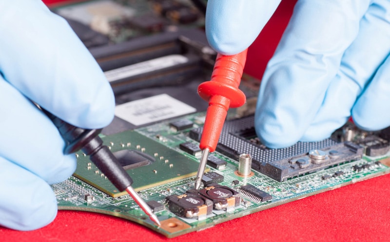 circuit board testing in repair service close-up