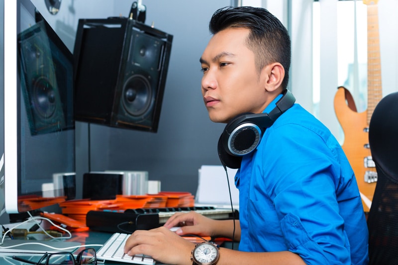 Indonesian man in recording studio