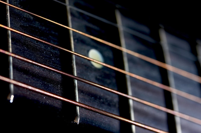 Guitar strings and frets