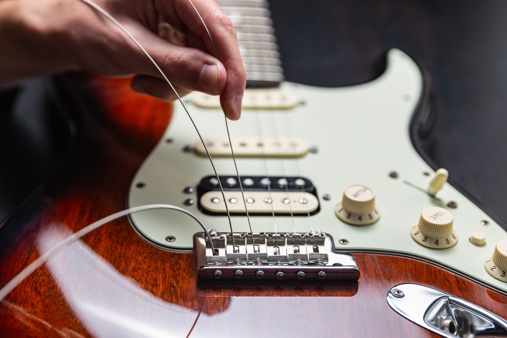 Replacing strings on an electric guitar